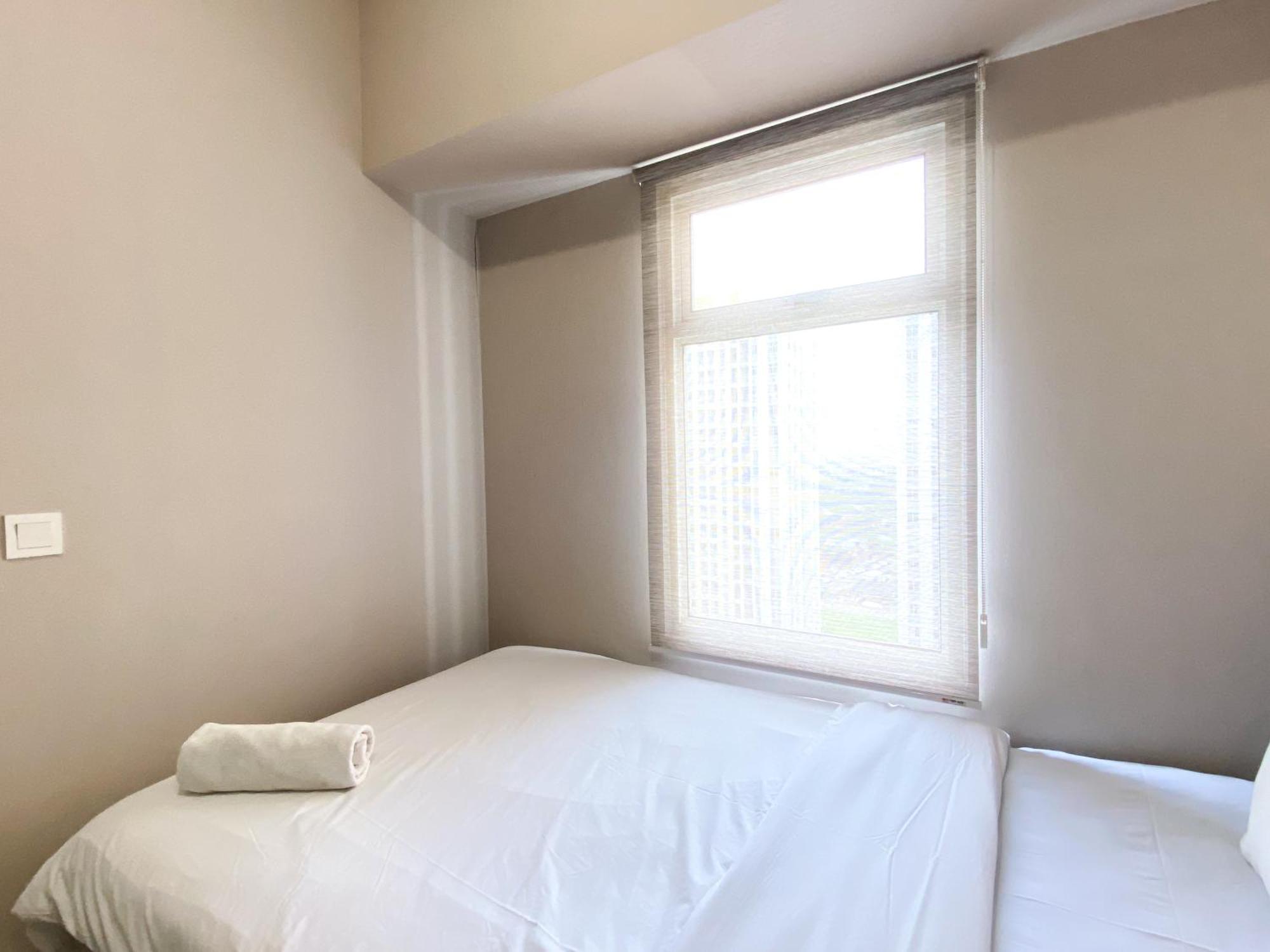 Warm Living And Homey 2br At Springlake Summarecon By Travelio Apartemen *
